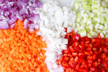 Onion carrots daikon pepper red cut chopped cook preparation close up