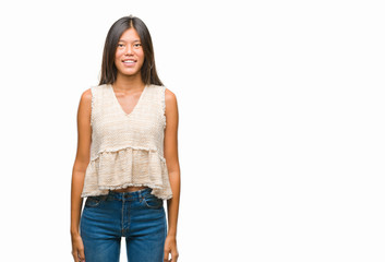 Obraz premium Young asian woman over isolated background with a happy and cool smile on face. Lucky person.