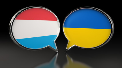 Obraz premium Luxembourg and Ukraine flags with Speech Bubbles. 3D illustration