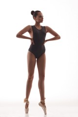 Young and incredibly beautiful ballerina is posing and dancing