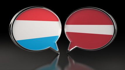 Luxembourg and Latvia flags with Speech Bubbles. 3D illustration