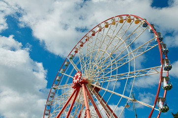 ferris wheel on blue sky in the park