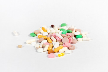 colorful pills on white background