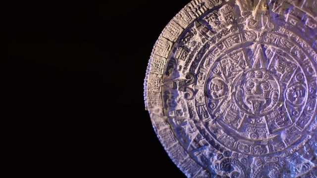 Mayan calendar on black background