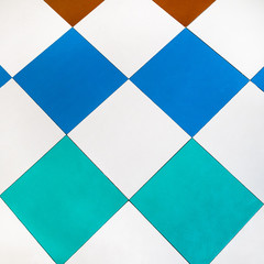 checkered flooring from multicolored PVC tiles