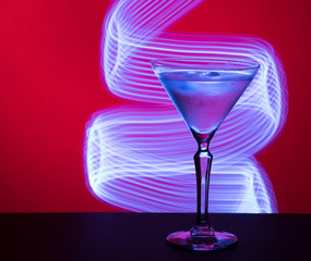 martini glass, red background