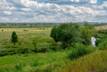 Fototapeta na wymiar View of the river among meadows in Donbass 2