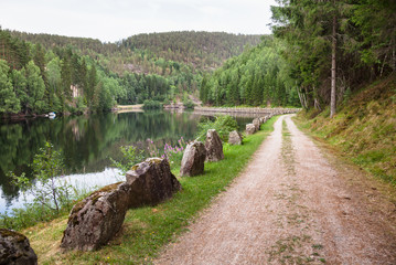Winding old road along the Telemark Canal in Southern Norway