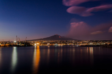 Naklejka na ściany i meble Etna in eruption at sunset