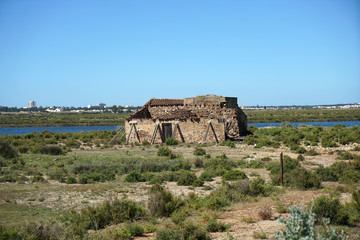 Salt lakes in Portugal in the Algarve on the border with Spain and its product in close up 