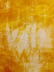 Texture of a wall in yellow color
