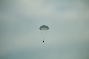 Army paratroopers display at air show festival.