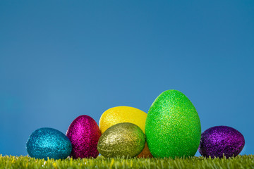 easter eggs in green grass