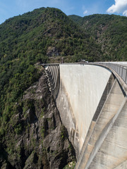 Amazing dam of Contra Verzasca Ticino, Switzerland. The dam creates a water reservoir Lago di Vogorno. Place for bungee jumping and where some scenes of James Bond movie was taken place. August, 2018