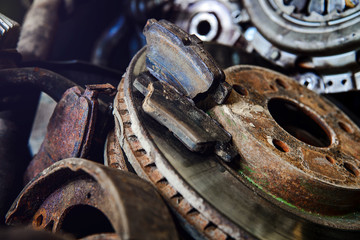 old rusty car parts with shallow depth of field