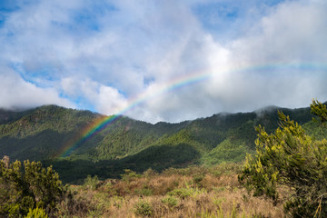 Fototapeta premium Rainbow over the Parque Nacional de la Caldera de Taburiente on the island of La Palma in the Canary Islands, Spain.