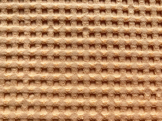 Background - textile wafer beige fabric./
Background - texture of beige waffle fabric.