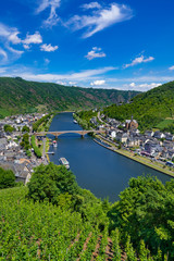 The town of Cochem, Germany, in the summer. It lies in the most romantic part of the Moselle Valley, where the river curves between two hiking paradises - Eifel and Hunsrück.