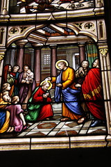 Fototapeta na wymiar Baptême, vitrail de l'église Saint Seine à Corbigny, Bourgogne