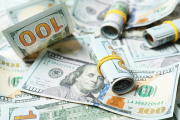 Fototapeta premium Many dollar banknotes as background. National American currency