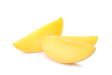 Fototapeta na wymiar Fresh juicy mango slices isolated on white