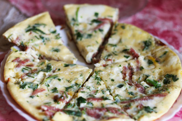 tasty magnificent omelet with greens and sausage