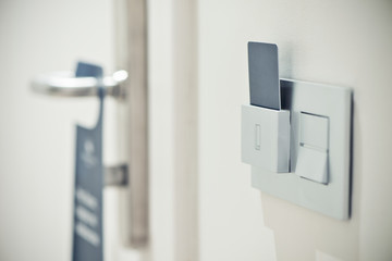 Fototapeta na wymiar Modern door room with card key in hotel room