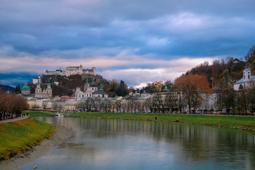 Fototapeta na wymiar Castle and fortress Hohensalzburg on mountain Festung and river Salzach in Salzburg city, Austria.