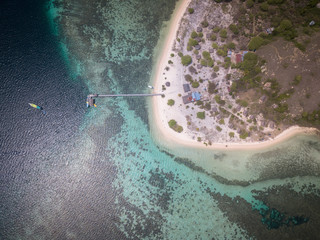 Top view of tourist ship and jetty in the Kanawa island, East Nusa Tenggara, Indonesia