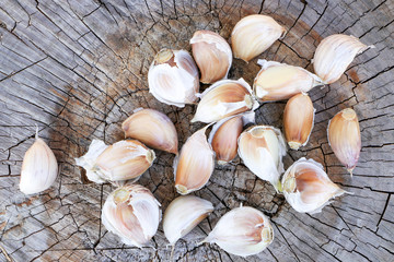 Cloves on a wooden surface. View from above. Close-up.