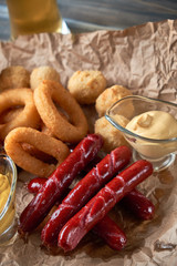 Grilled sausages with glass of beer pic