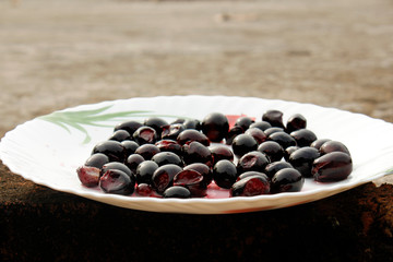 grape in white plate