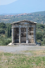 Fototapeta na wymiar Ruins of ancient greek temple, mausoleum of the Saithidae, a prominent Roman family, ancient Messini, Peloponnese, Greece