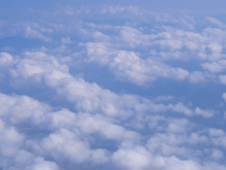 Blue sky clouds seen from airplane beautiful with blue sky background nature.