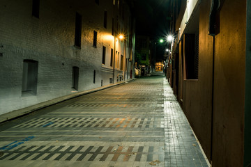 Fototapeta na wymiar back street at night