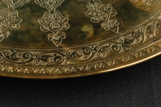 close-up of the tray with Eastern engraving