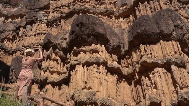 Female Tourist Taking Photo of Pha Chor Canyon in Northern Thailand