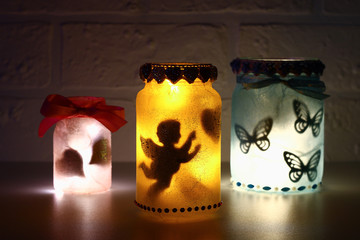 Diy Fairy Jar on white brick wall background. Gift ideas, decor St February 14, Valentines Day, love