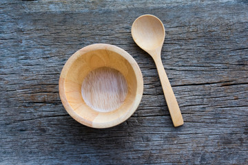spoon and fork on wooden background