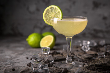 Alcoholic or non-alcoholic cocktail with lemon citrus and ginger with added liqueur, vodka, champagne or martini. Cool drink. Easy Bartenders Recipes and Ideas
