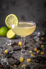 Alcoholic or non-alcoholic cocktail with lemon citrus and ginger with added liqueur, vodka, champagne or martini. Cool drink. Easy Bartenders Recipes and Ideas