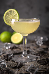 Alcoholic or non-alcoholic cocktail with lemon citrus and ginger with added liqueur, vodka, champagne or martini. Cool drink. Easy Bartenders Recipes and Ideas