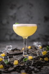 Alcoholic or non-alcoholic cocktail with lemon citrus and ginger with added liqueur, vodka, champagne or martini. Cool drink. Easy Bartenders Recipes and Ideas