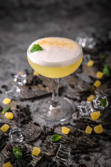 Alcoholic or non-alcoholic cocktail with lemon citrus and ginger with added liqueur, vodka, champagne or martini. Cool drink. Easy Bartenders Recipes and Ideas