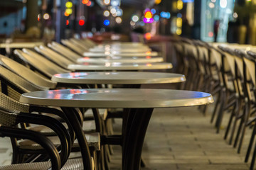 Tables and chairs in row