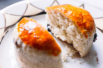 Close up Raisin Scone cut in half. Eat with tea. Good bakes pastry.