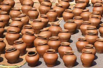 Fototapeta na wymiar A lot of orange pots. Ceramic Pottery in Potter Square, Bhaktapur Town, Nepal