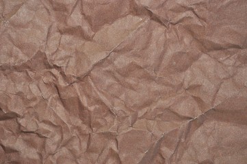 crumpled brown paper background or texture