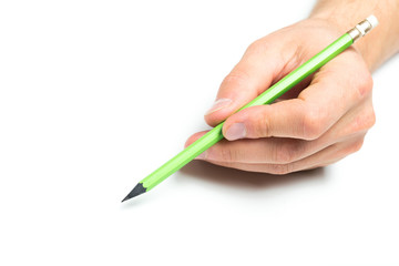 Men's hand holding wooden pencil on isolated backgroung, close up