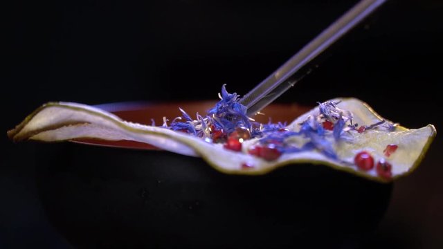 Colorful decoration on a chip adjusted by forceps
